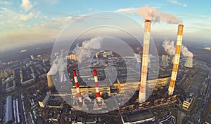 Territory of power plant with high chimneys at