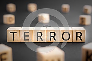 Terror - word from wooden blocks with letters, Terror horror