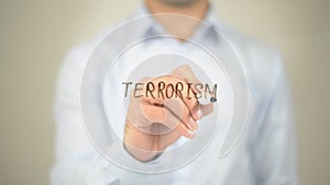 Terrorism, man writing on transparent screen