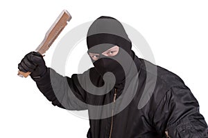 Terrorist in black uniform with big knife