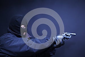 Terrorist with gun aimed shoot