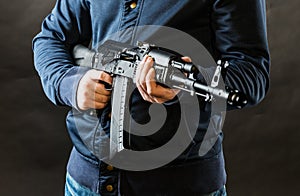 Terrorist holding kalashnikov rifle