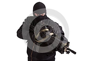 Terrorist with machine gun isolated