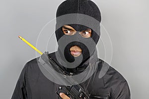 Terrorist with a pencil in his weapon