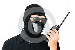 Terrorist with sunglass and walkietalkie