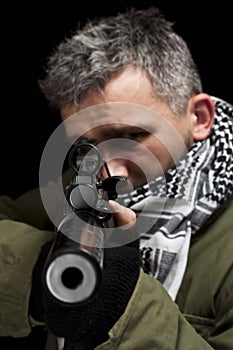 Terrorist whit gun photo