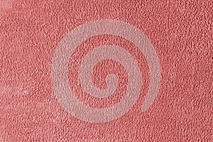 Terry cloth, red towel texture background. Soft fluffy textile bath or beach towel material