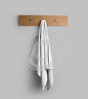 Terry white towel template on a wooden hanger, hanging towelling for design, branding, presentation photo