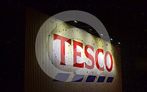 Tesco logo on supermarket sign