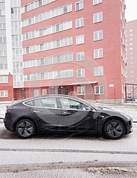 Tesla car parked in parking lot