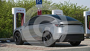 Tesla Model Y Juniper at charging station