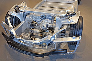 Tesla plug-in electric car chassis and battery