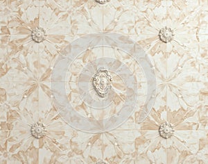 Tessellating Ashford Pearl marble tiles with mother-of-pearl iridescence, featuring Art Nouveau floral vein motifs for an elegant photo