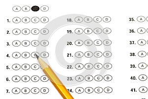 Test score sheet with answers and pencil