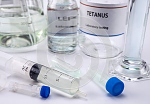 Test tetanus in laboratory, Syringe with medication for sampling, conceptual image