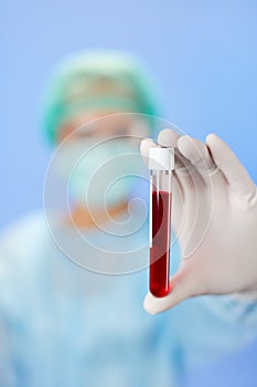 Test tube blood samples in doctor's hand