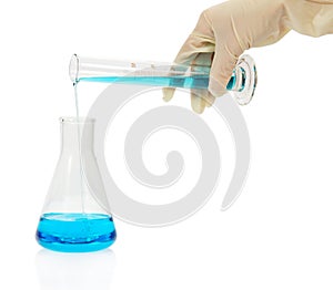 Test-tube with blue liquid for chemical in hand