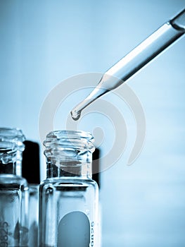 Test tube containing chemical liquid in laboratory, lab chemistry or science research concept.