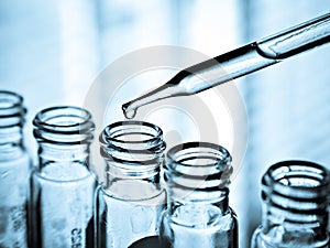 Test tube containing chemical liquid in laboratory, lab chemistry or science research concept.