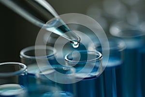 Test tube of glass overflows liquid solution potassium photo