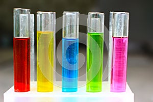 Test tubes with colored aqueos solutions of dyes.