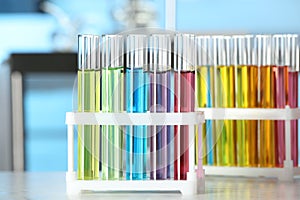 Test tubes with liquid samples on table. Laboratory analysis