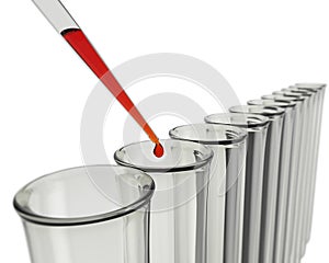 Test tubes with pipette and red liquid