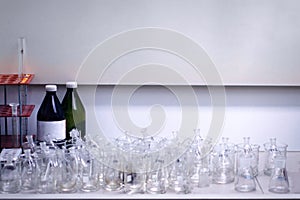 Test tubes with samples of soil, water and air in a real environmental laboratory. Chemical and biochemical analysis of material