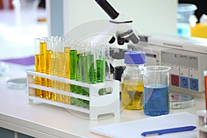 Test tubes with samples on table in laboratory
