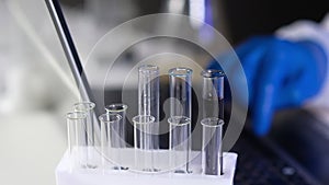 Test tubes with tests and biomaterial in clinical laboratory.