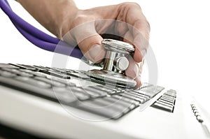 Testing a computer keyboard with stethoscope