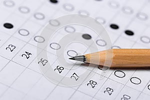 Testing in exercise and exam paper. computer sheet with pencil in school test room, education concept