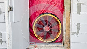 Blower door test: Testing the house for airtightness, on the front door installed a powerful fan.