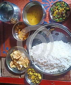 Testy and delicious lunch in northern India is as rice pulse vegetables etc