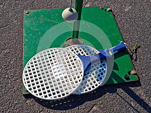 Tetherball Totem Tennis Ball attached to a green metal pole