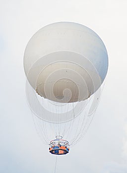 Tethered aerostat balloon.