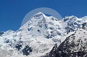 Tetnuldi mountain, rocky peaks with snow in Svanetia Caucasian mountains in Georgia
