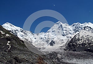 Tetnuldi mountain, rocky peaks with snow in Svanetia Caucasian mountains in Georgia