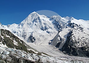 Tetnuldi mountain, rocky peaks with snow in Svanetia Caucasian mountains in Georgia