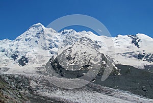 Tetnuldi mountain, rocky peaks with snow in Svanetia Caucasian mountains in Georgia