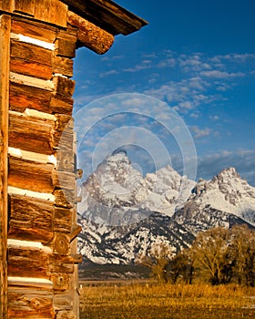 Teton Mountains with Log Cabin Barn