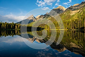 Teton Mountains Reflect in Calm Waters of String Lake