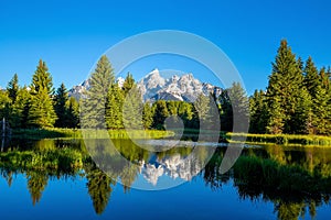 The Teton range at Schwabacher`s Landing in Grand Teton National Park, WY