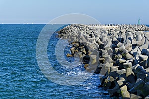 Tetra-pods or concrete breakwater blocks at Tomis, Constanta harbour. photo