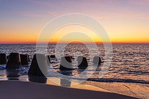 Tetrapods at the beach of Sylt Island at sunset