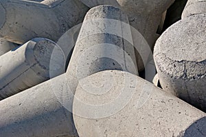 Tetrapods are shaped concrete blocks designed to protect the coastline from erosion.