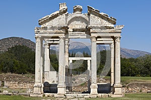 Tetrapylon ancient monument ruins in Aphrodisias. Archaeology landmark in Turkey