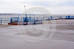 Tetyushi, Tatarstan / Russia - May 2, 2019: Empty passenger river port on the Volga River on a rainy day. Problems of the inland