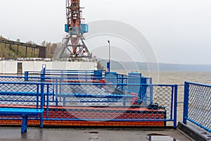 Tetyushi, Tatarstan / Russia - May 2, 2019: Empty passenger river port on the Volga River on a rainy day. Problems of the inland