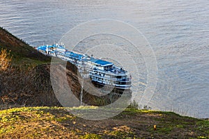 Tetyushi, Tatarstan, Russia - May 2, 2022: Four-deck cruise ship berth Tetyushi city on Volga river